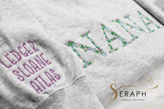 Floral Title Sweatshirt w/ Names on Sleeves